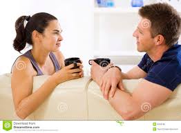 couple talking on couch