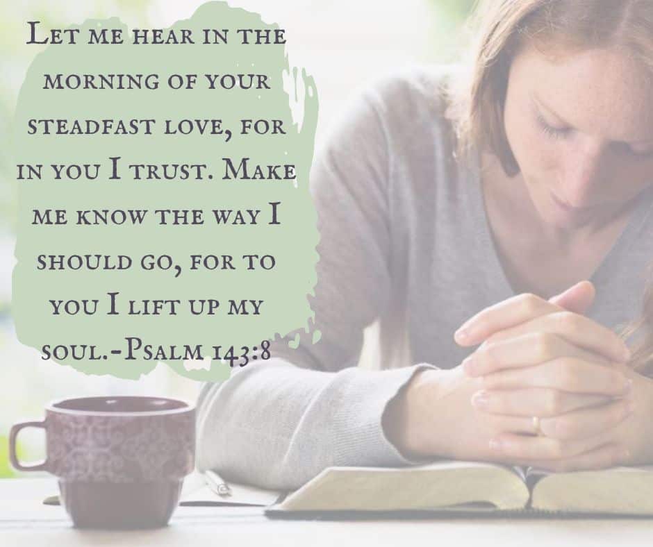 Trusting God's plan woman praying while reading the Bible