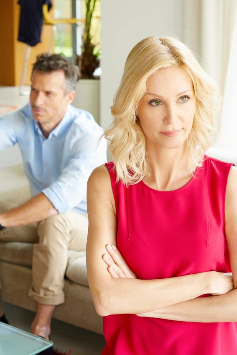 woman with back to husband for how to love your husband when marriage is hard