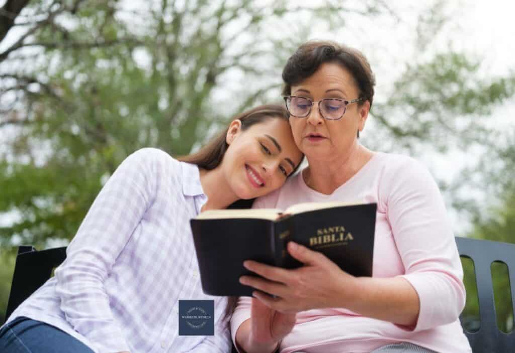 Woman reading Bible to her daughter/granddaughter