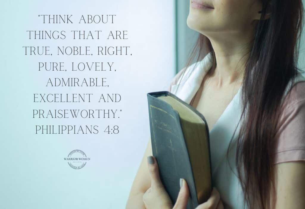 woman looking up, holding a Bible, with Bible verse Philippians 4:8 for blog post What is the helmet of salvation