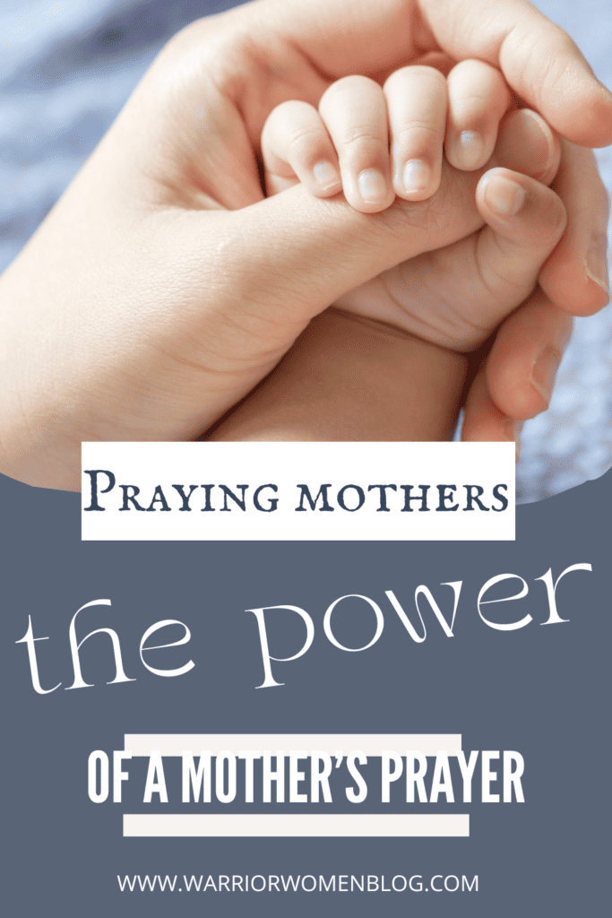 pin image of mother's hand holding baby's hand